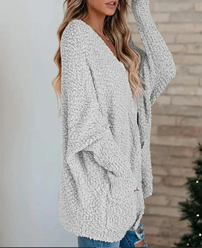 Knitted double pocket cardigan sweater